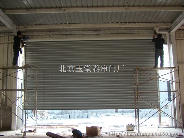 北京体育馆路安装水晶卷帘门铝合金卷帘门安装
