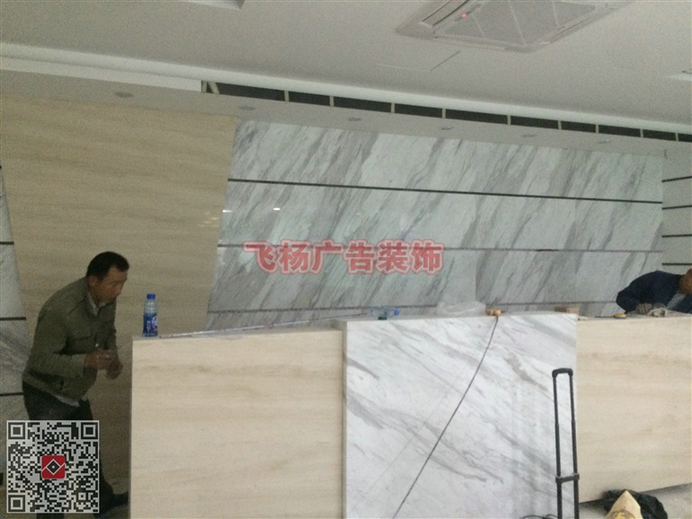 深圳做公司背景墙的广告装饰公司